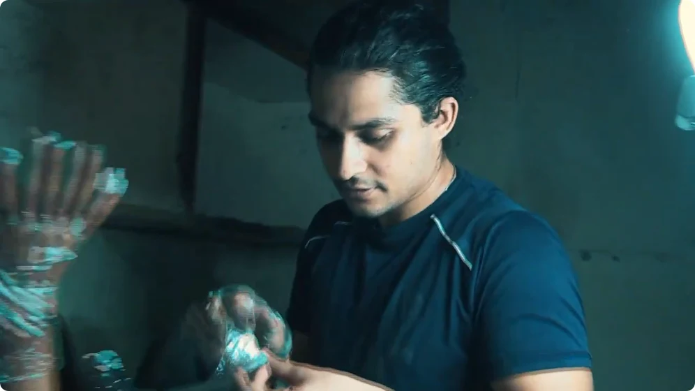 I play Guru in a blue shirt in Deepu Rox