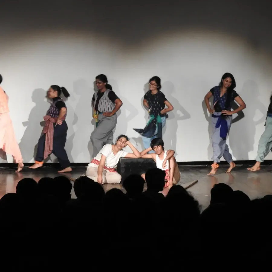 The ensemble performs on stage in Beyond the Land of Hattamala