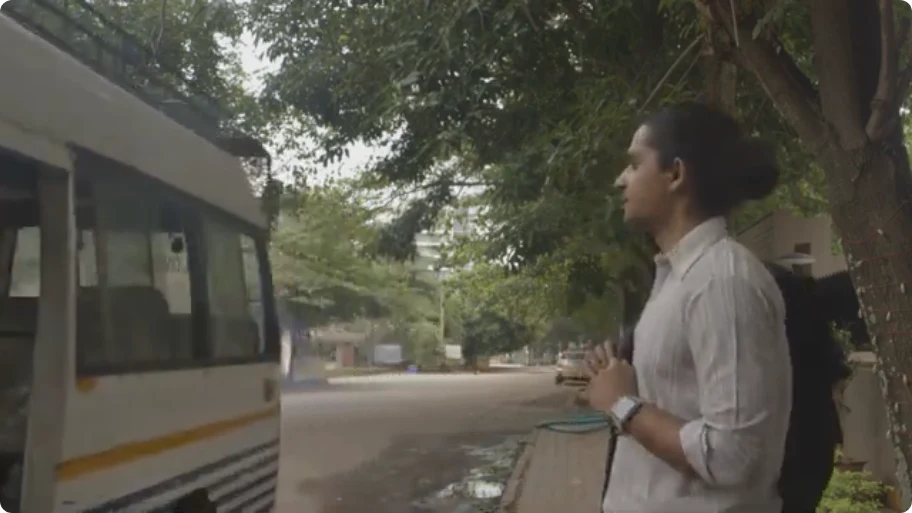 I play Arjun speaking outside a bus